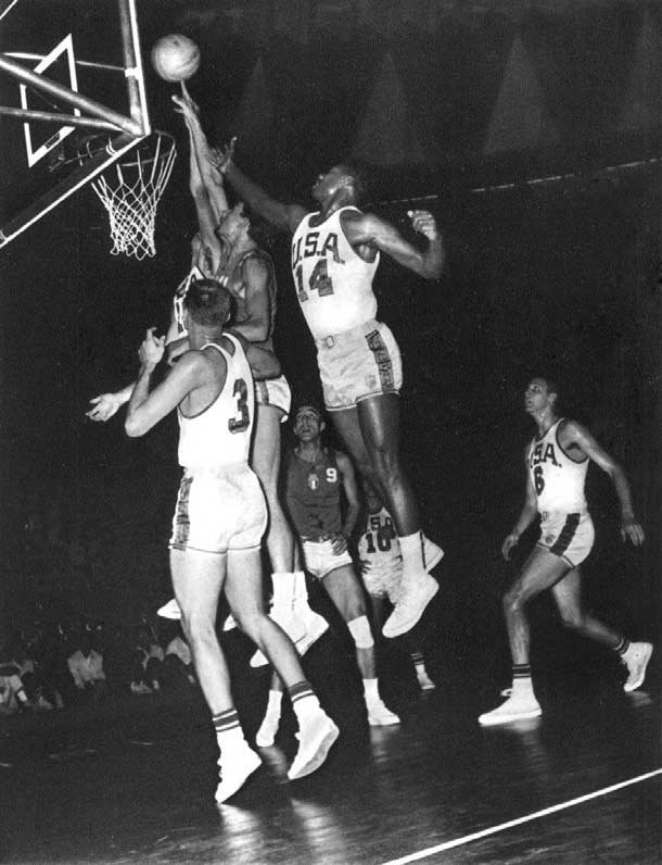 Black and white creative commons photo of Oscar Robertson jumping for a basketball during the Olympics.